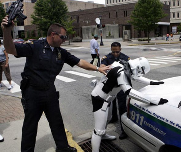 http://www.chilloutpoint.com/images/2010/01/funniest-costumed-people-arrests/funny-caught-in-costume-14.jpg