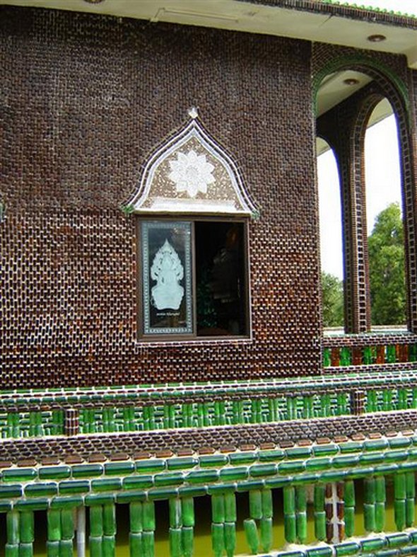 Buddhist temple built out of Heineken and Chang beer bottles