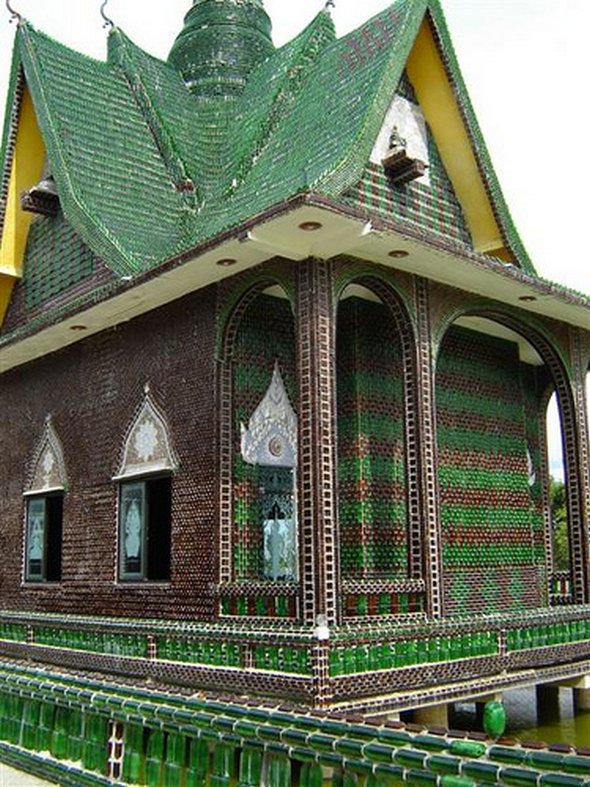 Buddhist temple built out of Heineken and Chang beer bottles