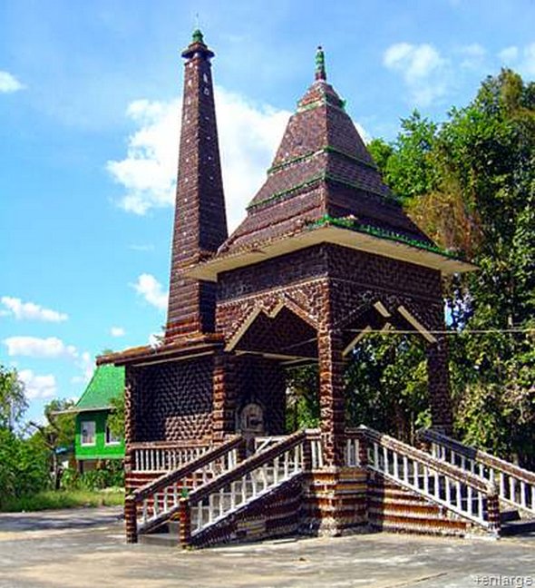 Buddhist temple built out of Heineken and Chang beer bottles