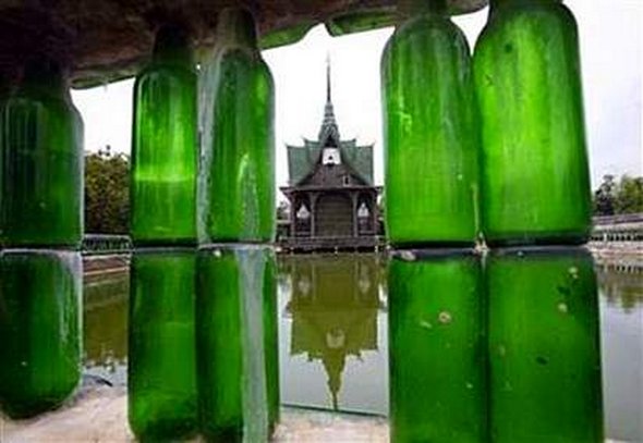 Buddhist temple built out of Heineken and Chang beer bottles