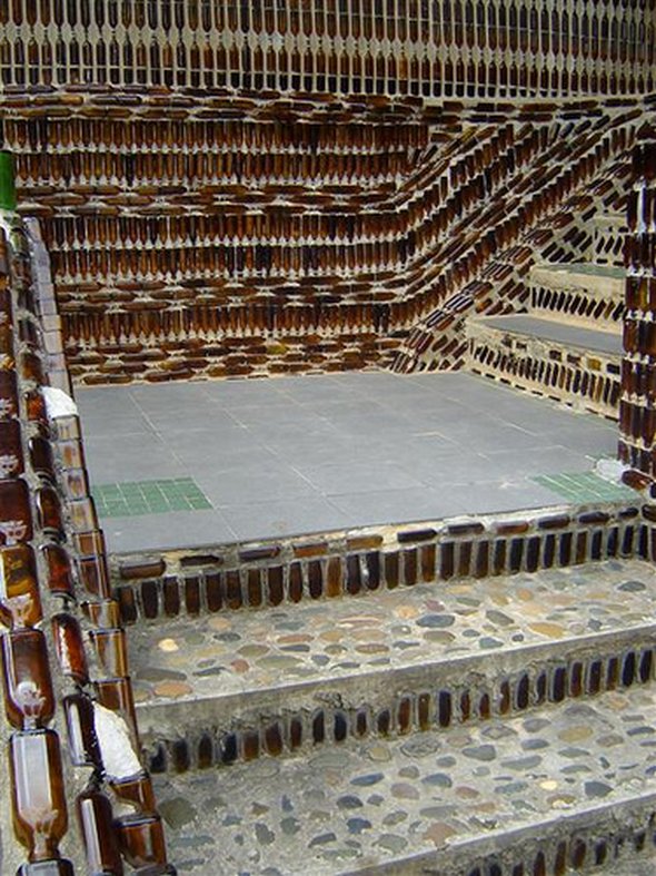 Buddhist temple built out of Heineken and Chang beer bottles