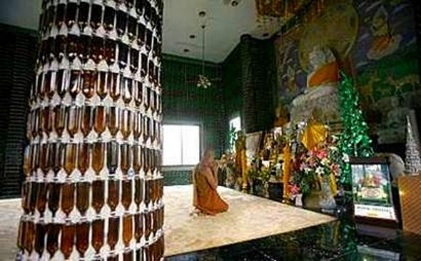 Buddhist temple built out of Heineken and Chang beer bottles