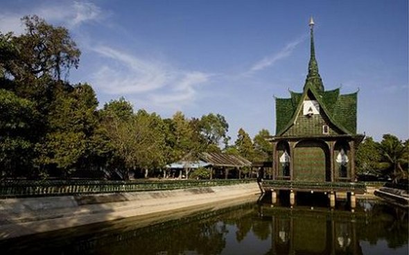 Buddhist temple built out of Heineken and Chang beer bottles