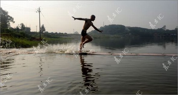 Gliding on Water (Qing Gong) Performed by Monk of South Shaolin Temple gliding on water by monk 23 in Gliding on Water (Qing Gong) Performed by Monk of South Shaolin Temple