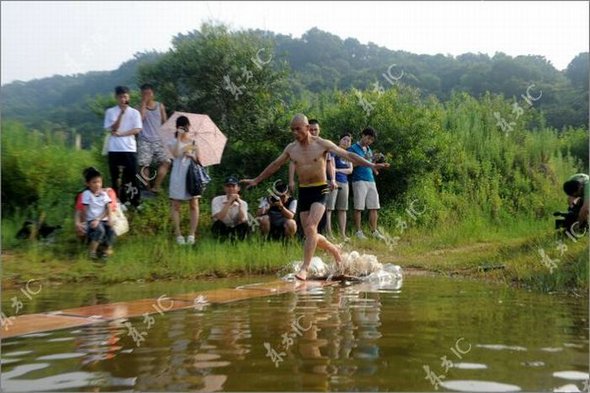 Gliding on Water (Qing Gong) Performed by Monk of South Shaolin Temple gliding on water by monk 28 in Gliding on Water (Qing Gong) Performed by Monk of South Shaolin Temple