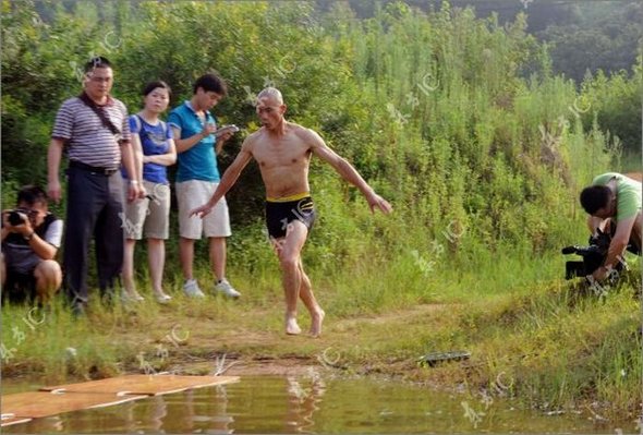 Gliding on Water (Qing Gong) Performed by Monk of South Shaolin Temple gliding on water by monk 30 in Gliding on Water (Qing Gong) Performed by Monk of South Shaolin Temple