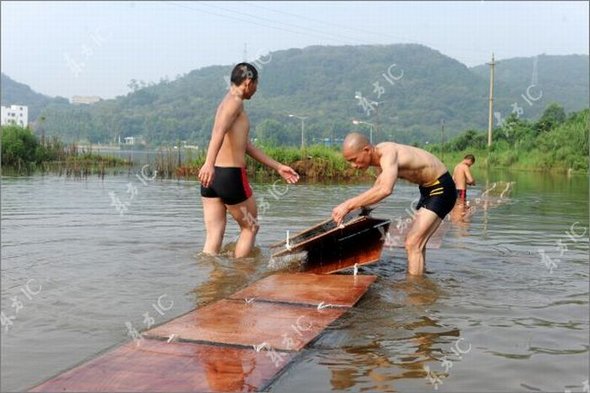 Gliding on Water (Qing Gong) Performed by Monk of South Shaolin Temple gliding on water by monk 38 in Gliding on Water (Qing Gong) Performed by Monk of South Shaolin Temple