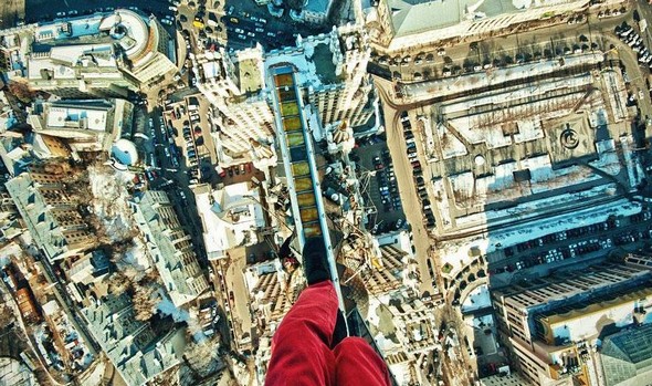 dizzying photos of ukrainian daredevil hanging from tall buildings 05 in Dizzying Photos of Ukrainian Daredevil Hanging from Tall Buildings