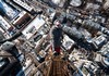 Dizzying Photos of Ukrainian Daredevil Hanging from Tall Buildings